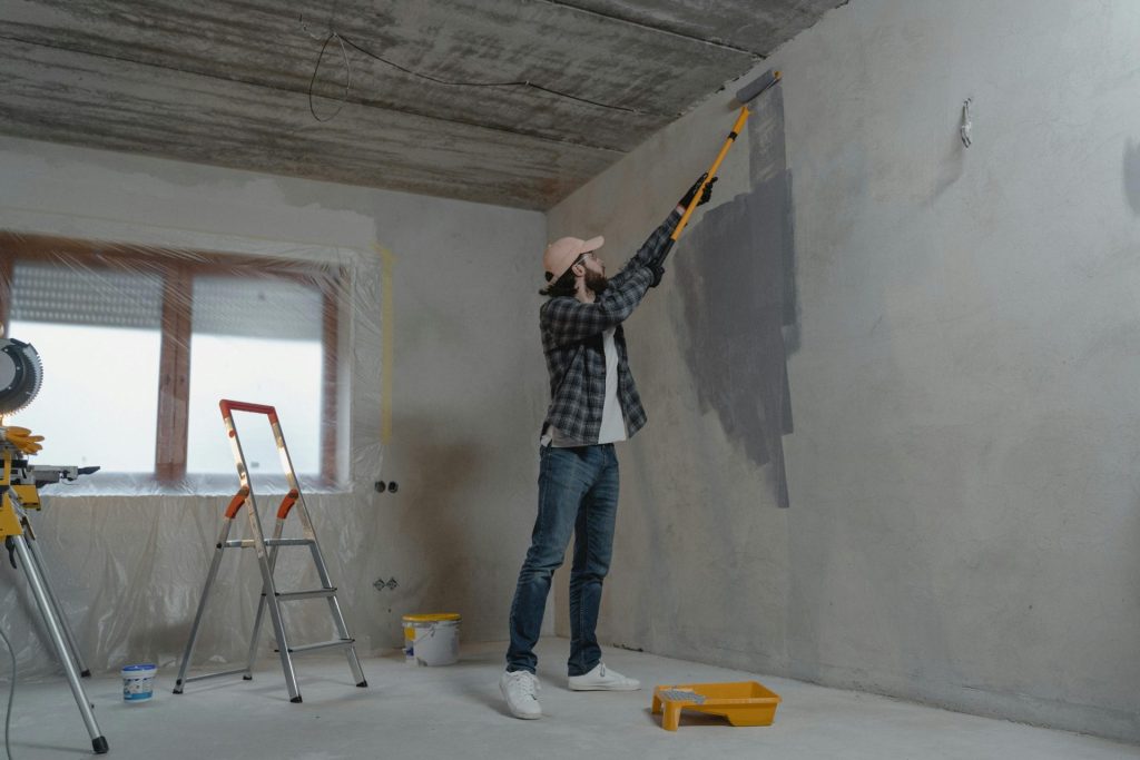 Man Painting the Wall